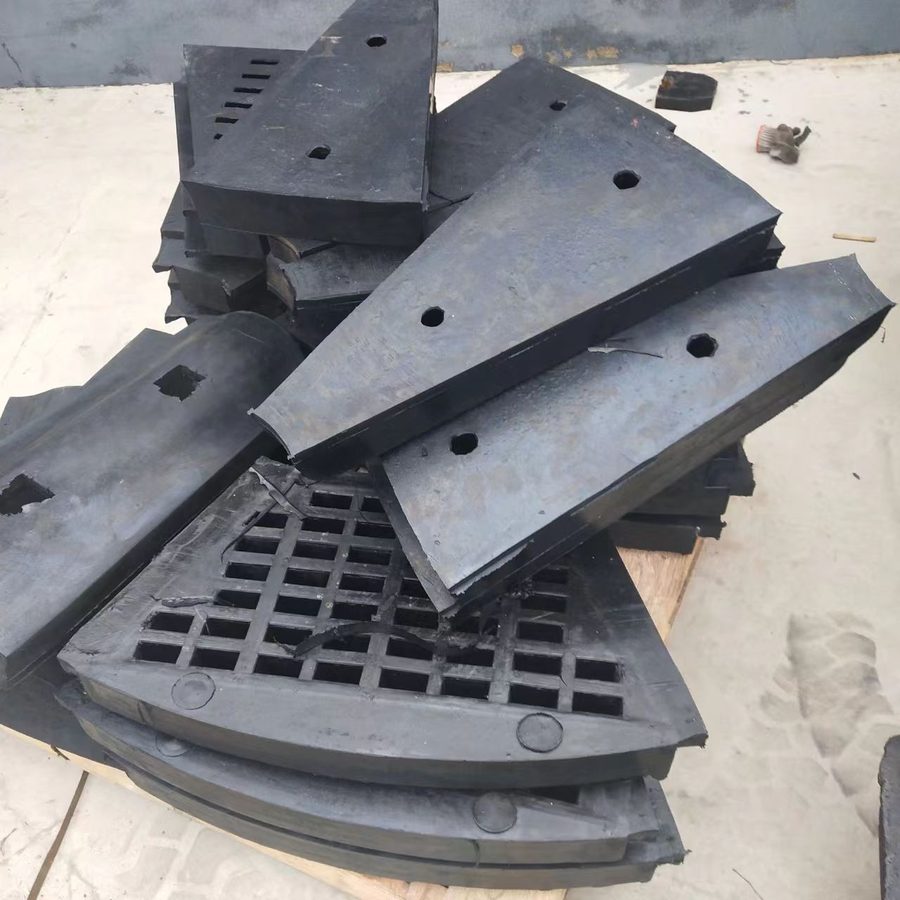 UHMWPE impact bars for conveyor loading zone
