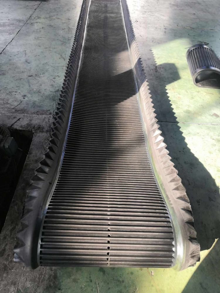 Rubber filter belt with perforations